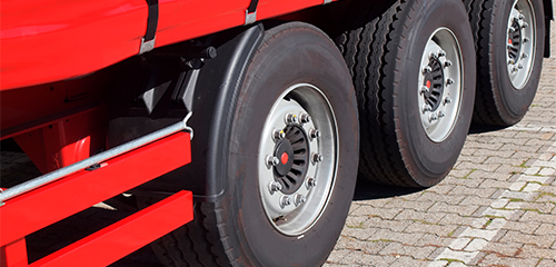 Tyres of a red truck
