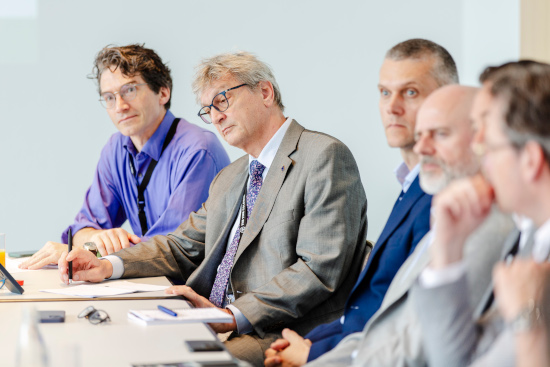 Photo of Paolo Tosoratti discussing